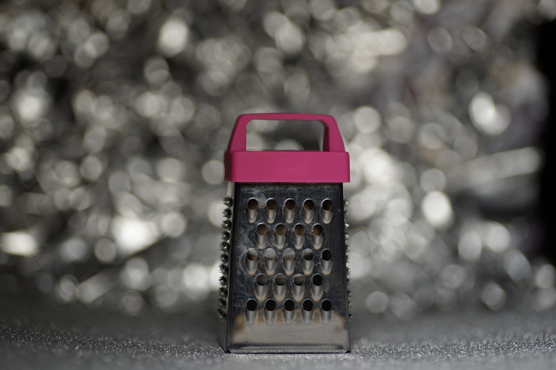grater, bokeh, wireless technology, nature, safety, personal accessory, focus on foreground, indoors, no people, single object, connection, electrical equipment