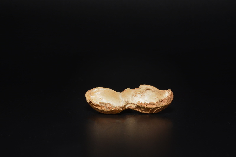 emotion, sweet food, peanut shell, copy space, food and drink, luxury, love, still life, black background, cut in half, temptation, cut out, snack, vegetable