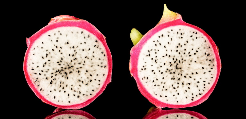 slice, seed, still life, colored background, black background, cross section, halved, 5K, no people, two objects, indoors, healthy eating, wellbeing, fruit