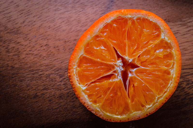 indoors, citrus fruit, wellbeing, iris, directly above, table, lemon, high angle view, food, cross section, orange, flower, fruit, persimmon, ripe, apricot