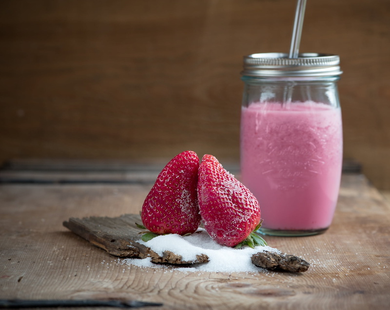 fruit, breakfast, pink color, drink, refreshment, food and drink, berry fruit, healthy eating, two, jar, container, indoors, table, wood - material, food