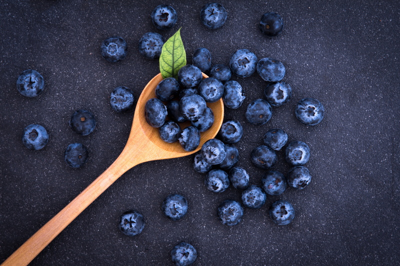 berry fruit, close-up, 5K, black color, indoors, blue, directly above, wooden spoon, antioxidant, no people, kitchen utensil, navy blue, eating utensil