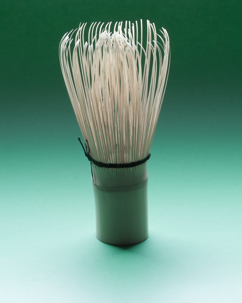 single object, green color, no people, colored background, wellbeing, food, hygiene, bamboo whisk, studio shot, stir, close-up, food and drink, cut out
