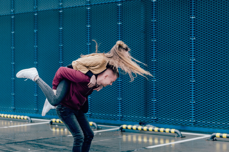 piggyback, long hair, love, young adult, nature, warm clothing, women, adult, leisure activity, woman, one person, real people, casual clothing, three quarter length