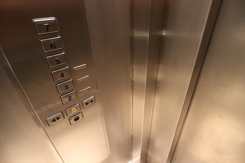 rise, up and down, convenience, telephone, silver colored, simplicity, technology, elevator, number, down, push button, communication, office, control
