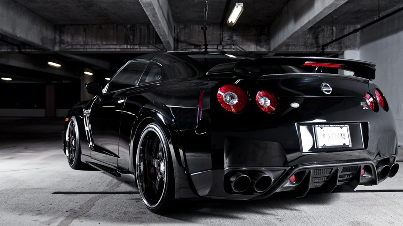 retro styled, Nissan GT-R, no people, parking lot, vehicle, transportation, indoors, built structure, black, motor vehicle, vintage car, red, black cars