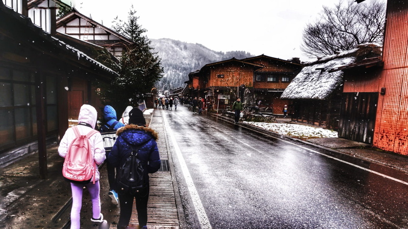 group, buildings, walking, snowing, girls, three, town, building exterior, transportation, travel, cold temperature, street, wood, trees, old building