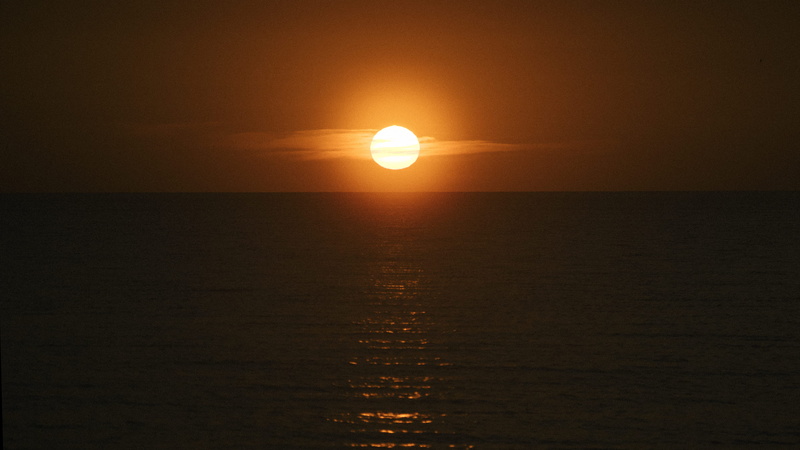 sky, no people, seascape, tranquility, reflection, water, belize sunrise, sun, bright sun, outdoors, belize, idyllic, horizon over water, ocean, tranquil scene