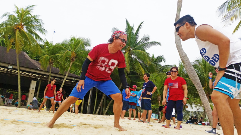 land, leisure activity, mid adult, outdoors, family day, men, beach games, males, child, women, patintero, sentosa, singapore, real people, asia, tree