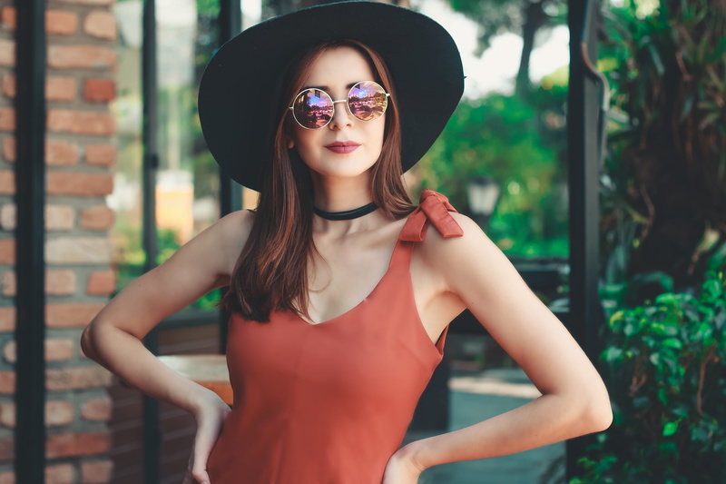 depth of field, sun hat, clothing, young adult, sun, leisure activity, outdoors, model, beautiful woman, wearing, focus on foreground, posing, day, glasses