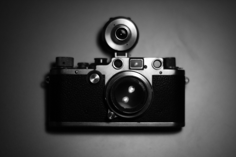 leica camera, speaker, slr camera, lens - optical instrument, lens, home video camera, reflection, glass, flash, black and white, video camera, antique