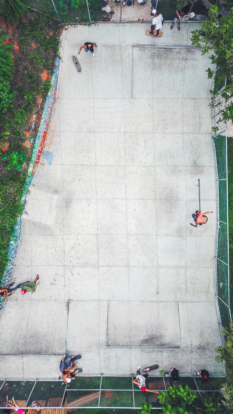 people, built structure, person, city, flowering plant, asphalt, high angle view, tree, aerial, group of people, daytime, building, grass, flag, 4K, intersection