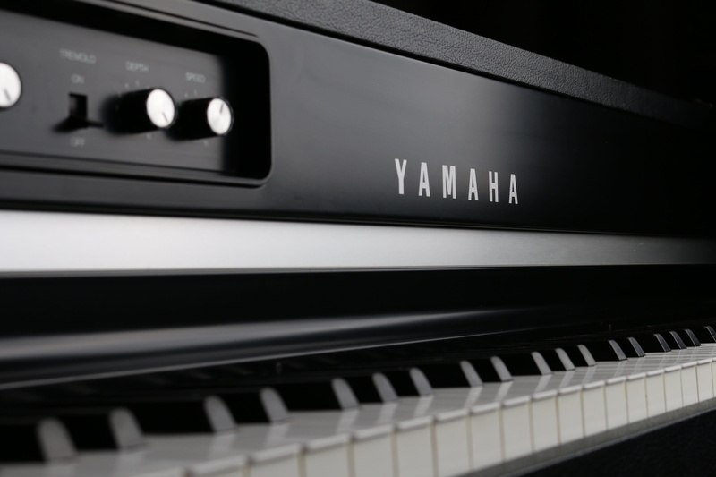 indoors, no people, piano keys, black, trademark, piano, music, piano key, electronic, yamaha, keyboard instrument, technology, sound, harmony, close, arts culture and entertainment