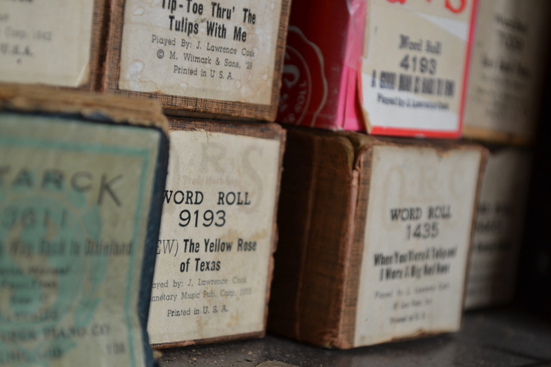 variation, close-up, western script, food and drink, food, retail, text, player piano, music rolls, still life, non-western script, selective focus, container