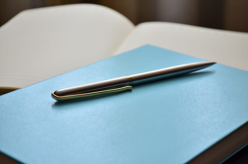 Notebook, paper, Focus, office supply, simplicity, write, education, notes, still life, business, no people, close-up, weekly, writing instrument, two objects