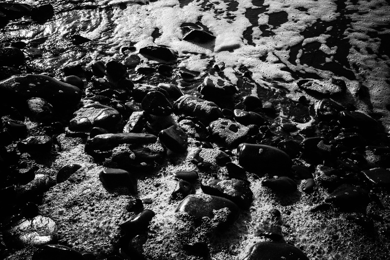black, rocks, land, surf, rock, sunlight, textured, united states, manzanita, outdoors, sea, rocky beach, solid, day, white, ocean, black and white, sand