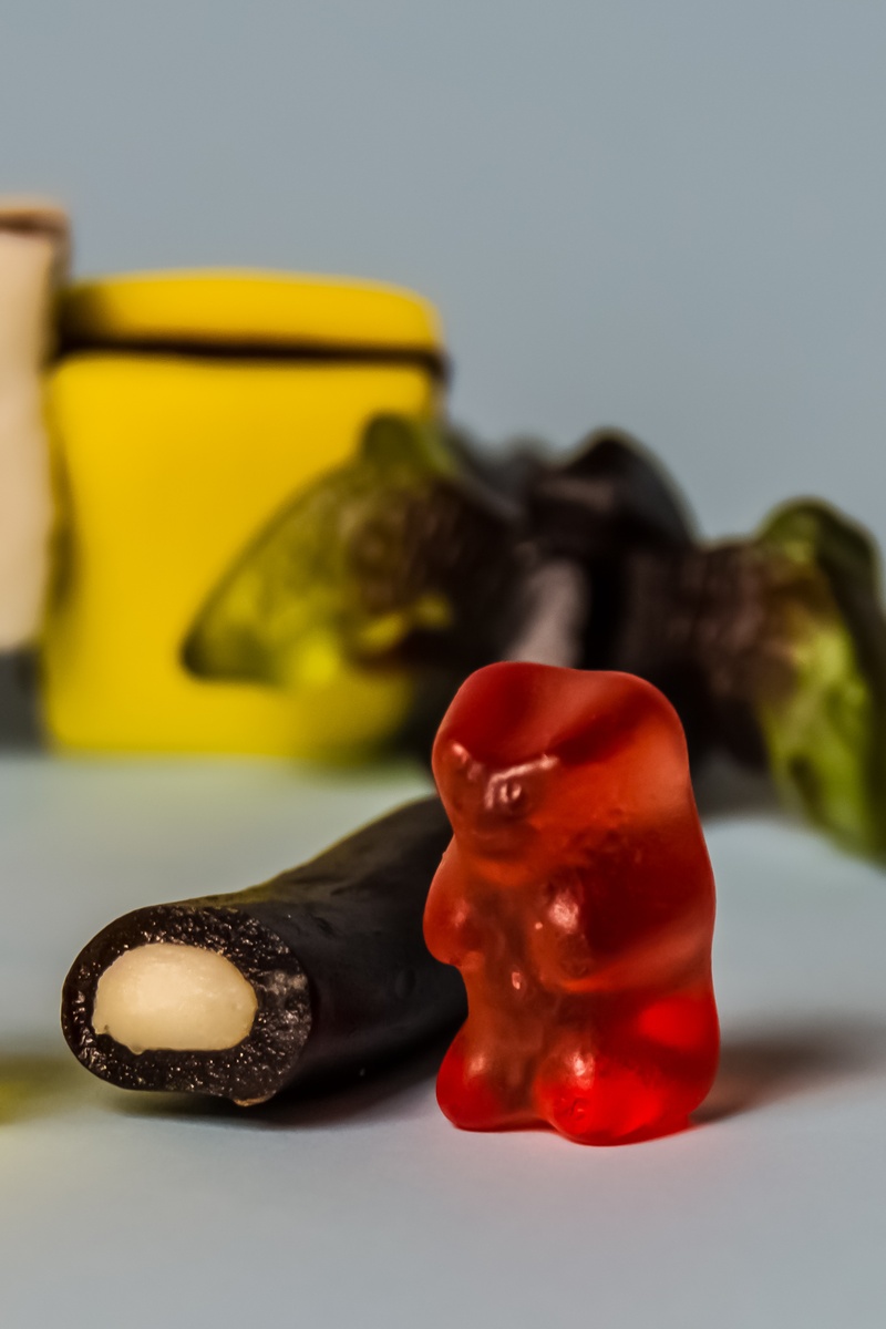 coins, gummibärchen, liquorice, sweet, freshness, studio shot, indulgence, unhealthy, focus on foreground, nibble, indoors, no people, food and drink, pepper