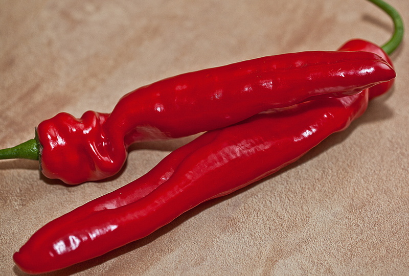 wellbeing, heat - temperature, the inside of the peppers, sweet peppers, high angle view, table, the freshness, the richness of, bell pepper, food and drink