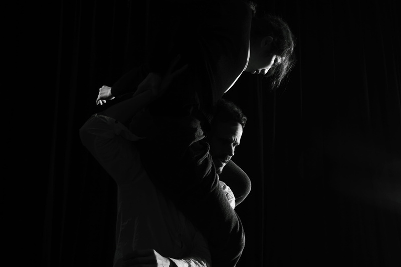 depression - sadness, woman, waist up, black background, stage, lifestyles, young men, profile, standing, dark, adult, studio shot, shadow, one person