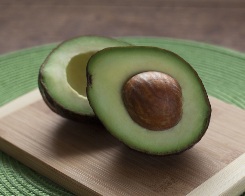 high angle view, seed, two, wooden, wellbeing, focus on foreground, brown, cross section, food and drink, close-up, avocado, avocados, no people, fruit