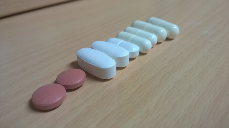 table, pharmacy, still life, nutrient additives, white color, drug, pill, close-up, vitamin, in a row, tablets, wood - material, 2K, no people, dietary supplements
