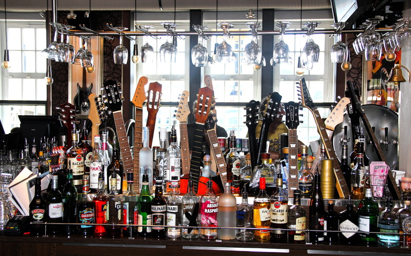 guitar neck, bicycle shop, day, vodka, beverages, shopping, club, gin, store, alcohol, one person, mojito, retail, lifestyles, whiskey, 5K, rock, choice