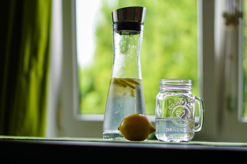 fruit juice, photography, water, nature, glass - material, household equipment, science, lemon, near, carafe, no people, focus on foreground, container