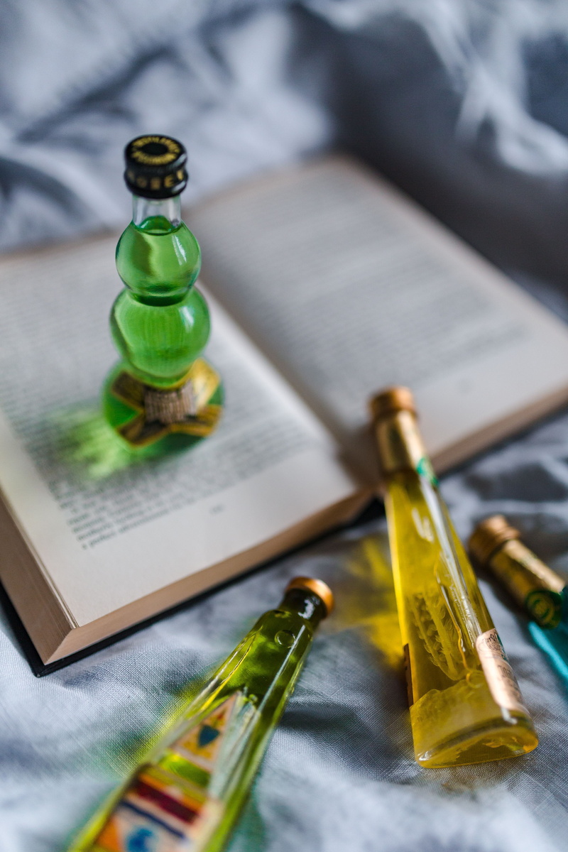 no people, alcohol, selective focus, liquor, colorful, book, multi colored, top view, reader, group, glass - material, liqueurs, high angle view, 5K, art and craft equipment