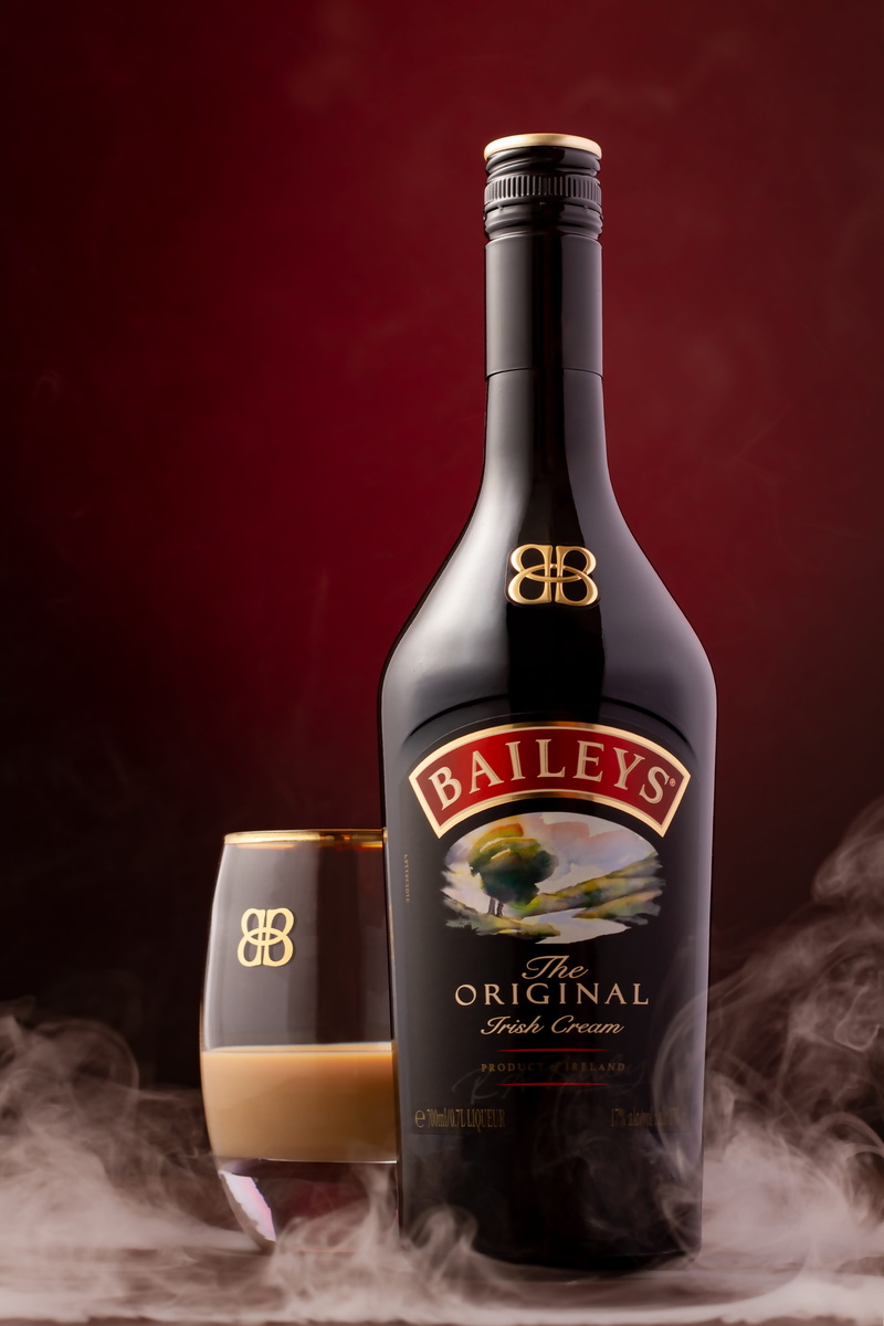 container, cream, alcohol, indoors, no people, benefit from, liqueur, drink, bottle, smoke, red, western script, 4K, studio shot, food, glass - material