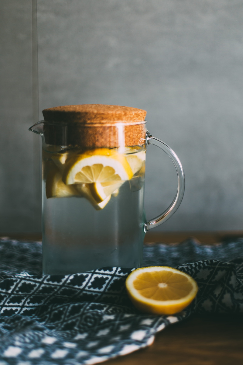 tea cup, water, top, indoors, cup, hydrate, sliced, fruit, still life, runner, no people, refreshment, cork, drink, lemons, jug, filled, clear, healthy eating