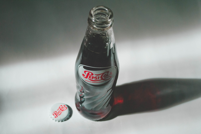 pepsi, glass bottle, glass, 4K, glass - material, cola, high angle view, single object, drink, communication, western script, surface, food and drink