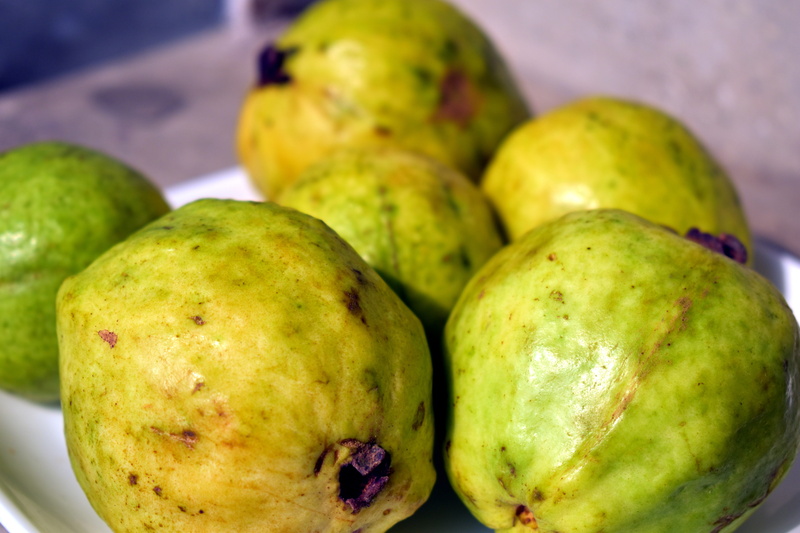 no people, tropical fruit, green color, papaya, ripe, guavas, healthy eating, close-up, psidium, retail, group of objects, market stall, focus on foreground