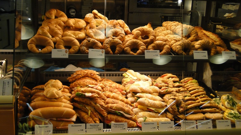display cabinet, chicken, afternoon tea, chicken meat, for sale, arrangement, food, breads, bread, indoors, store, snack, assorted, food and drink, the shop window