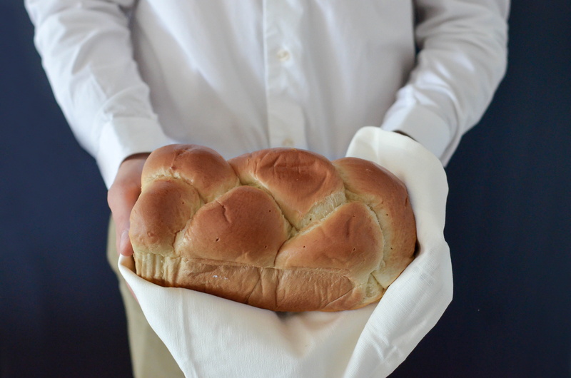 human hand, baking, chefs whites, preparation, front view, uniform, bread, man, person, leavened, midsection, adult, food and drink, food, one person, freshness