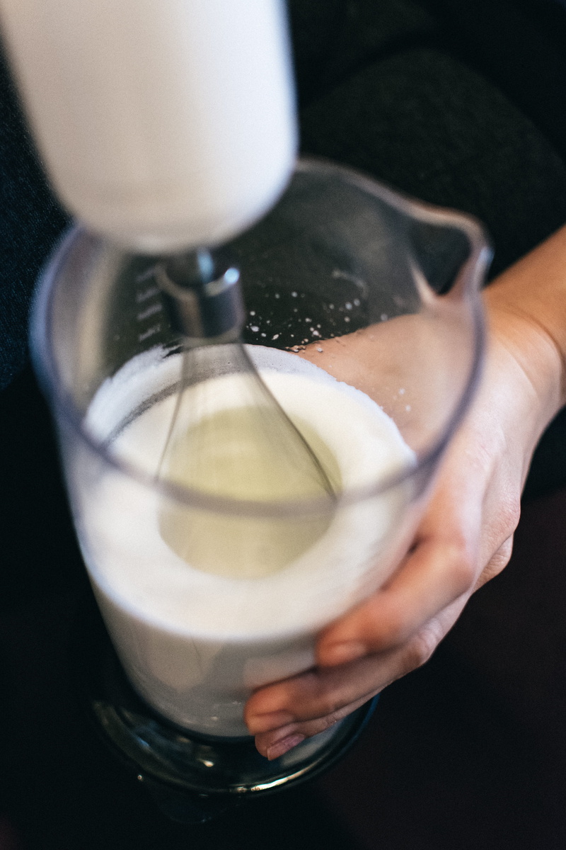 real people, food And Drink, focus on foreground, pouring, indoors, dough, holding, coffee - drink, drinking Glass, alcohol, freshness, glass, cup, kitchenware