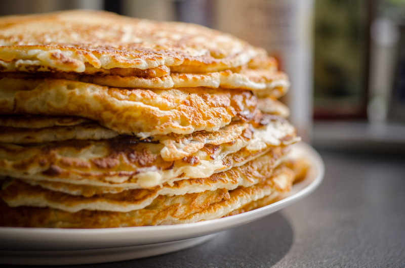sweet food, bread, indoors, table, focus on foreground, stack, savory pie, delicious, indulgence, food, temptation, traditional, baking, pile, breakfast