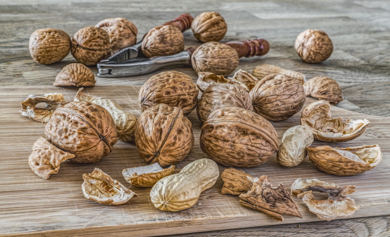 wood - material, pecan, peanut, selective focus, vegetable, nutshell, healthy, ingredient, walnut, large group of objects, bowl, produce, walnut in a shell