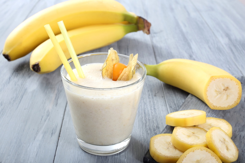fruit, straw, high angle view, drinking glass, drinking straw, banana, food and drink, drink, close-up, food, healthy eating, table, clear, wellbeing, wood - material