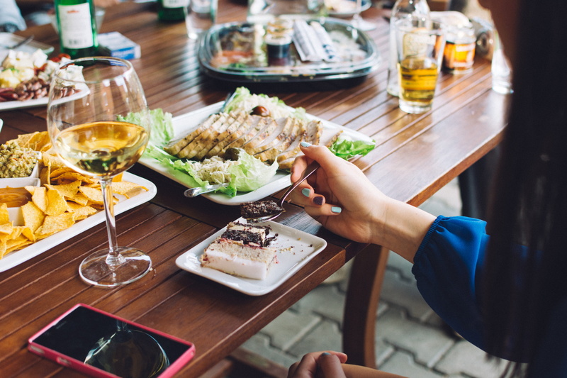 eating, plate, holding, hand, glass, refreshment, outside, business, meal, drink, food and drink, summer, restaurant, hands, freshness, wine, sweet, cake