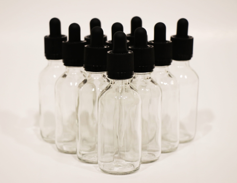 still life, in a row, white background, bottles, clear glass, dropper, container, transparent, arrangement, side by side, black color, 5K, indoors, close-up