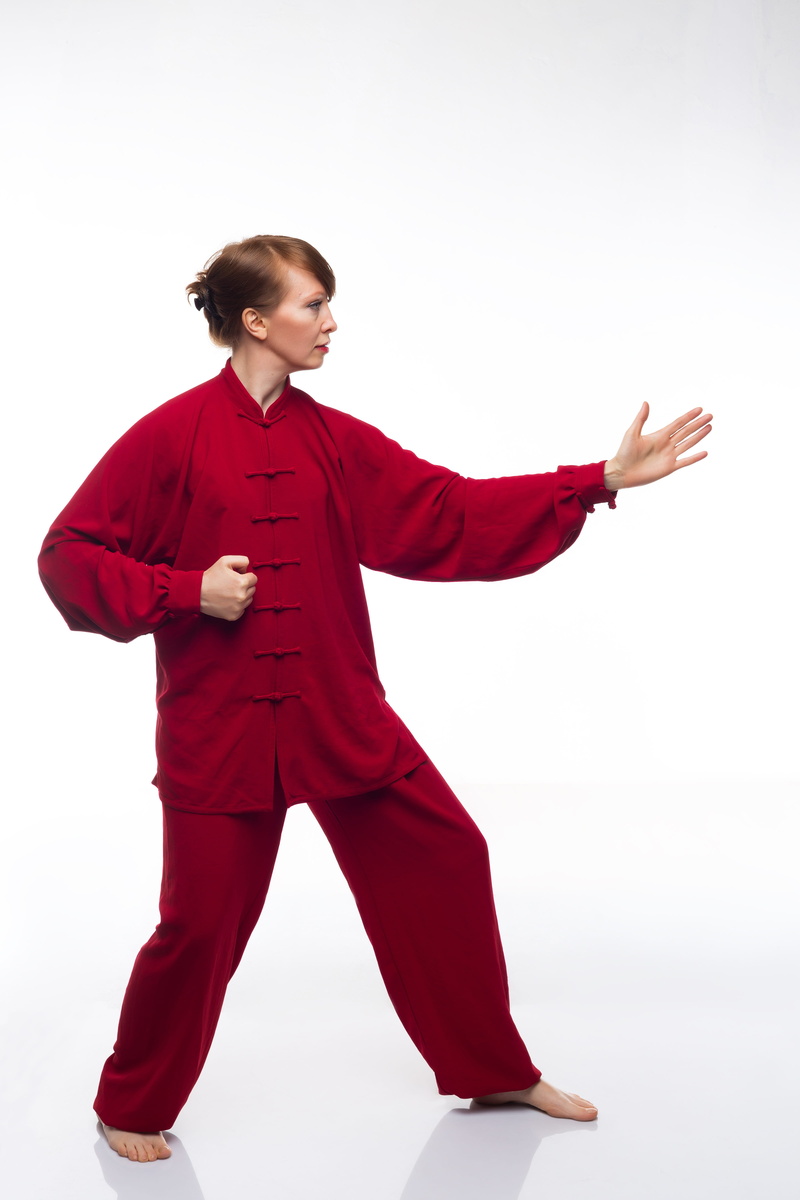 indoors, stand-alone, arms raised, human body part, gesturing, standing, full length, taijiquan, body part, young, studio shot, 4K, limb, adult, clothing