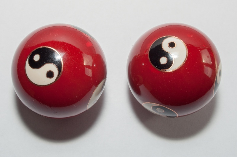 no people, fun, balls, cut out, food and drink, two objects, hollow balls, directly above, about, face, still life, indoors, metal, anthropomorphic, yang