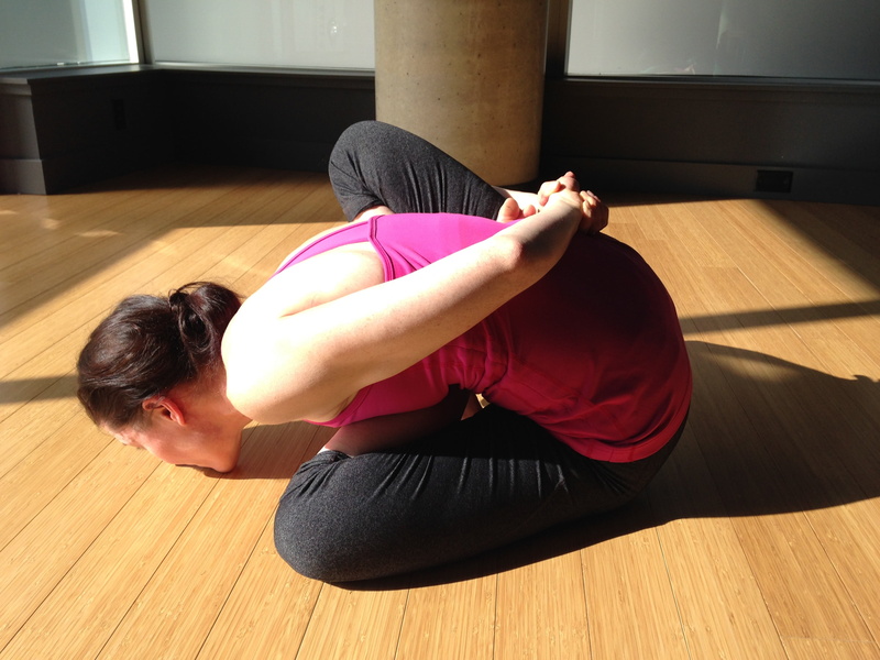 full length, health, stretching, pink, floor, home interior, sports clothing, wearing, kissing, hairstyle, sport, wood, lifestyles, woman, yoga pose, relaxation exercise