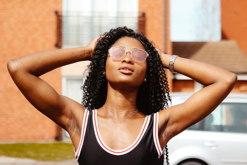 outdoors, woman, hair, brown hair, focus on foreground, touching, back, real people, arms, portrait, glass, white, glasses, black, girl, arms raised, hairstyle