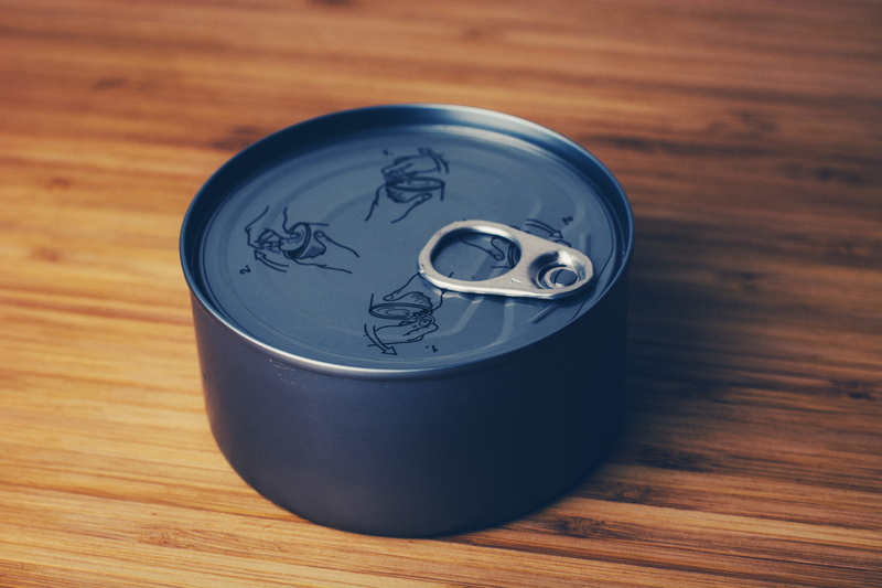 single object, silver colored, indoors, 5K, food and drink, three objects, no people, circle, wood grain, high angle view, metal, close-up, container