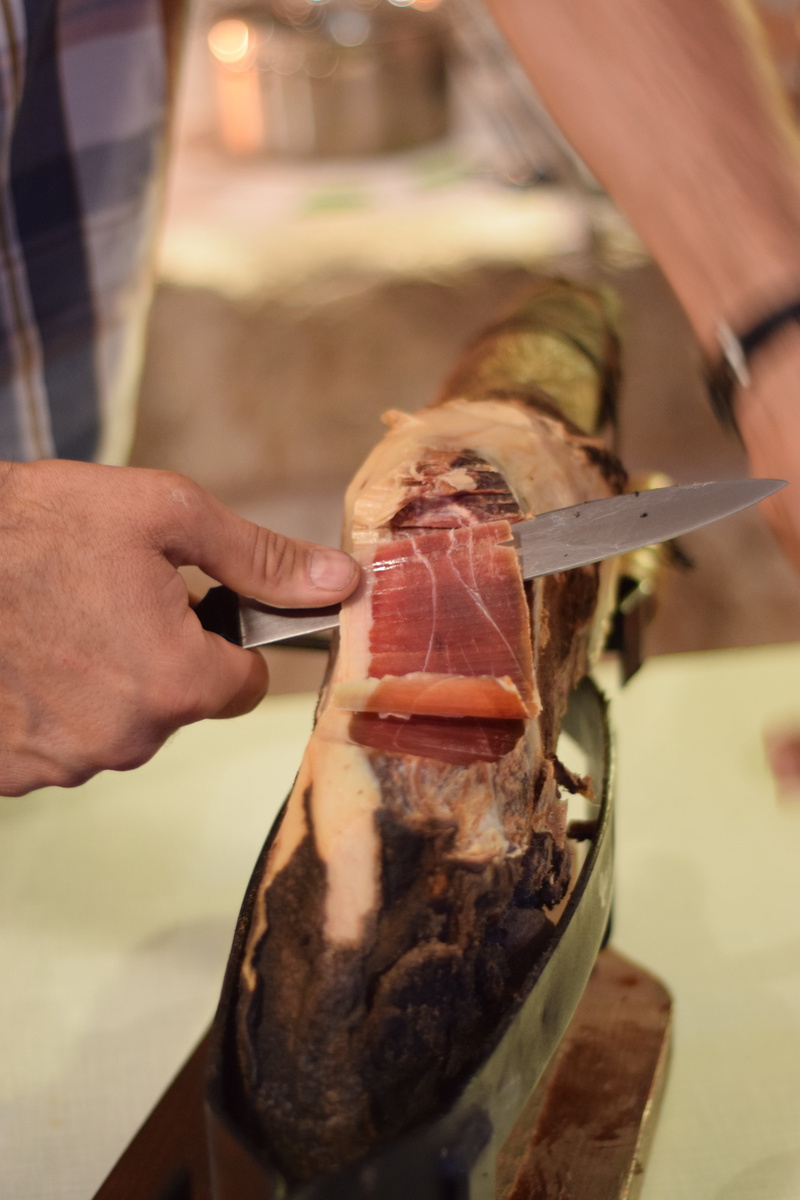 one person, butcher, croatia, preparation, mediterranean, freshness, preparing food, real people, prosciutto, meat, human hand, traditional, food, unrecognizable person