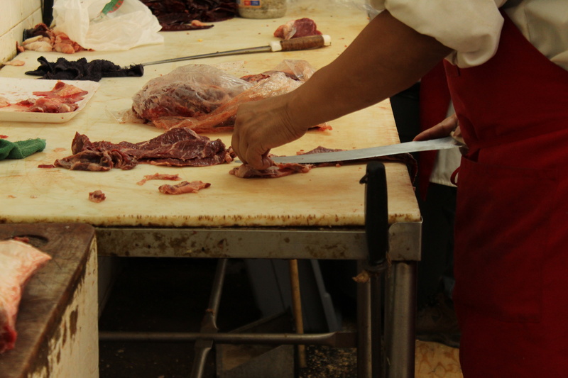 kitchen Knife, midsection, pork, cooking, food and drink, chef, human body part, working, butcher, holding, occupation, preparation, indoors, business