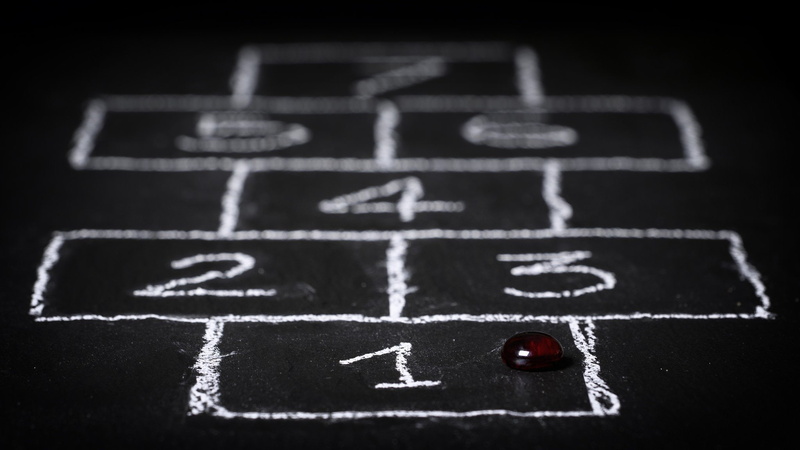 numbers, blackboard, handwriting, chalk - art equipment, planning, education, no people, close-up, black background, text, sport, number, relaxation, board