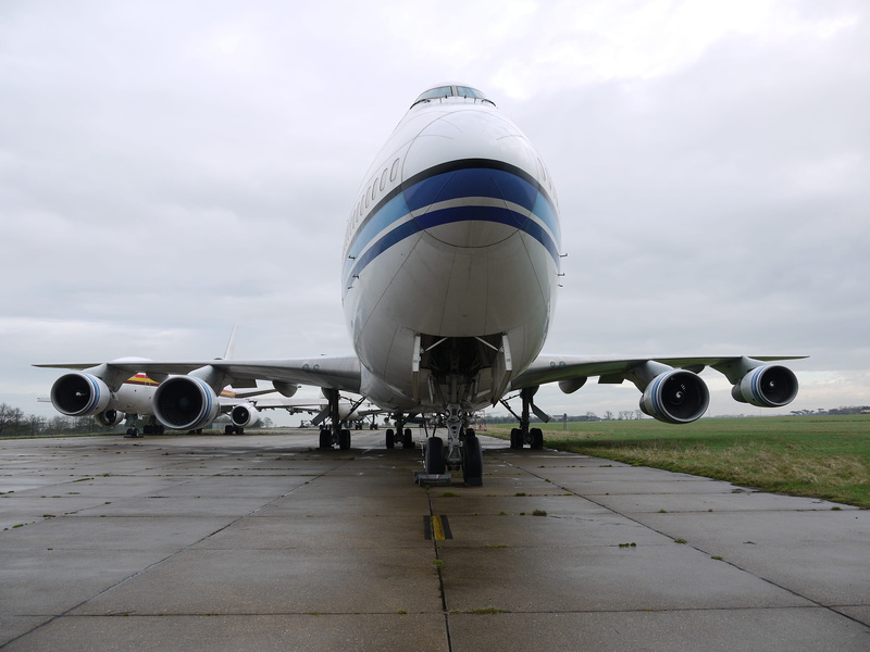 Close, stationary, Plane, day, nature, public transportation, cloud - sky, grey, jet engine, no people, sky, Front, mode of transportation, outdoors, travel