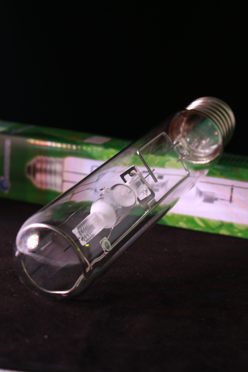 vial, plastic, studio shot, electricity, technology, green color, table, lighting equipment, light bulb, light, no people, close-up, indoors, communication